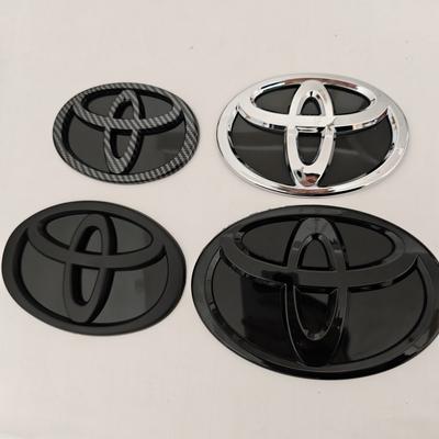 2026 Nouveau Pour Toyota Modifié Badge Calandre Avant Fond Noir Logo de Coffre de Voiture Convient pour Toyota RAV4 CAMRY COROLLA LANDCRUSER RA