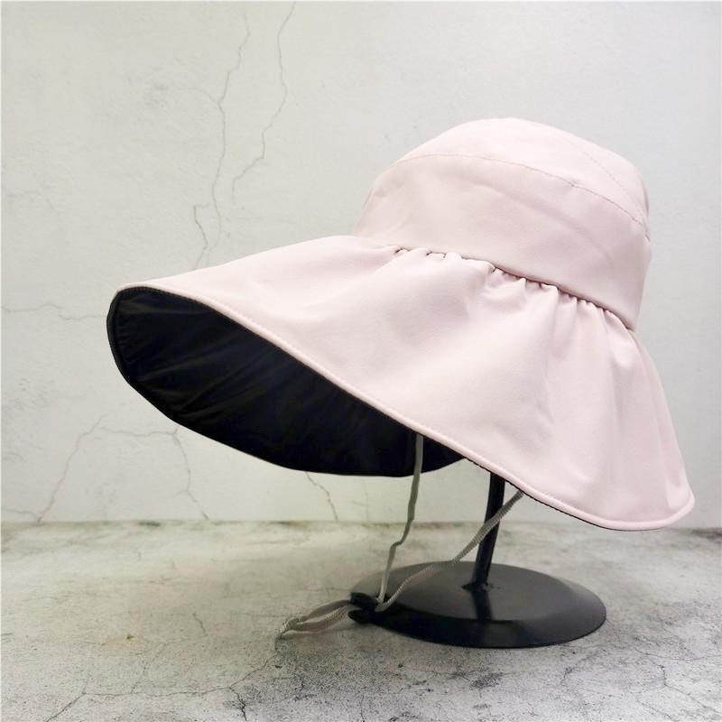 Women's Black Vinyl Bucket Hat with UV Face Shield, Adjustable & Foldable Summer Sun Protection Hat.