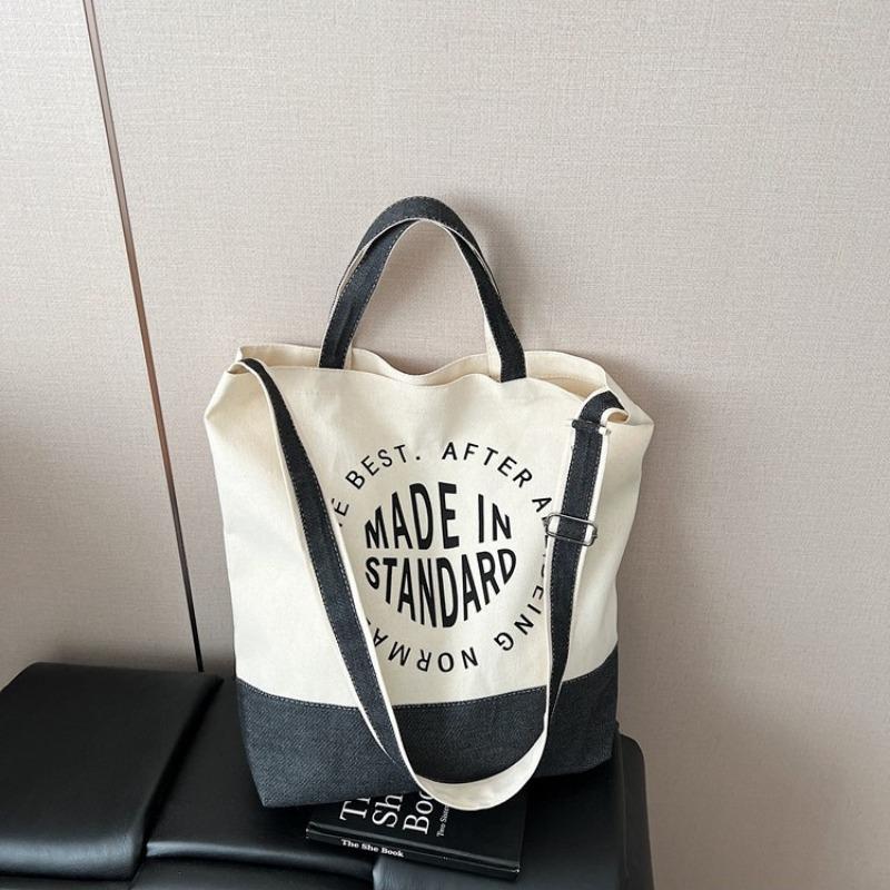 Niche casual canvas bag women's spring and summer new students class commuting shoulder bag trendy messenger bag
