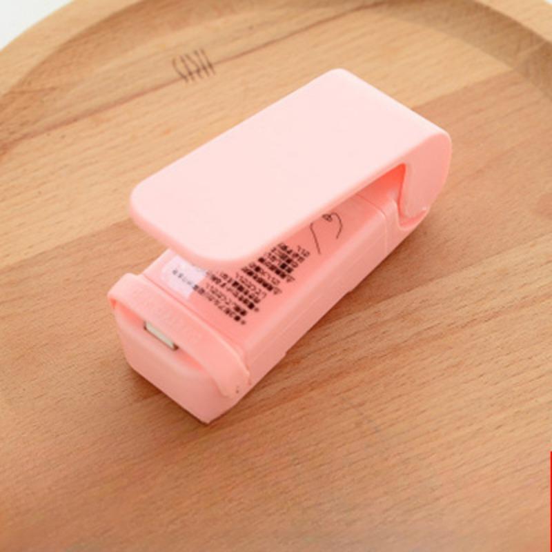 

Портативная мини-машина для запечатывания пищевых пластиковых пакетов, небольшая бытовая ручная машина для запечатывания под давлением, конфиденциальная машина для запечатывания bottom with magnet розовый