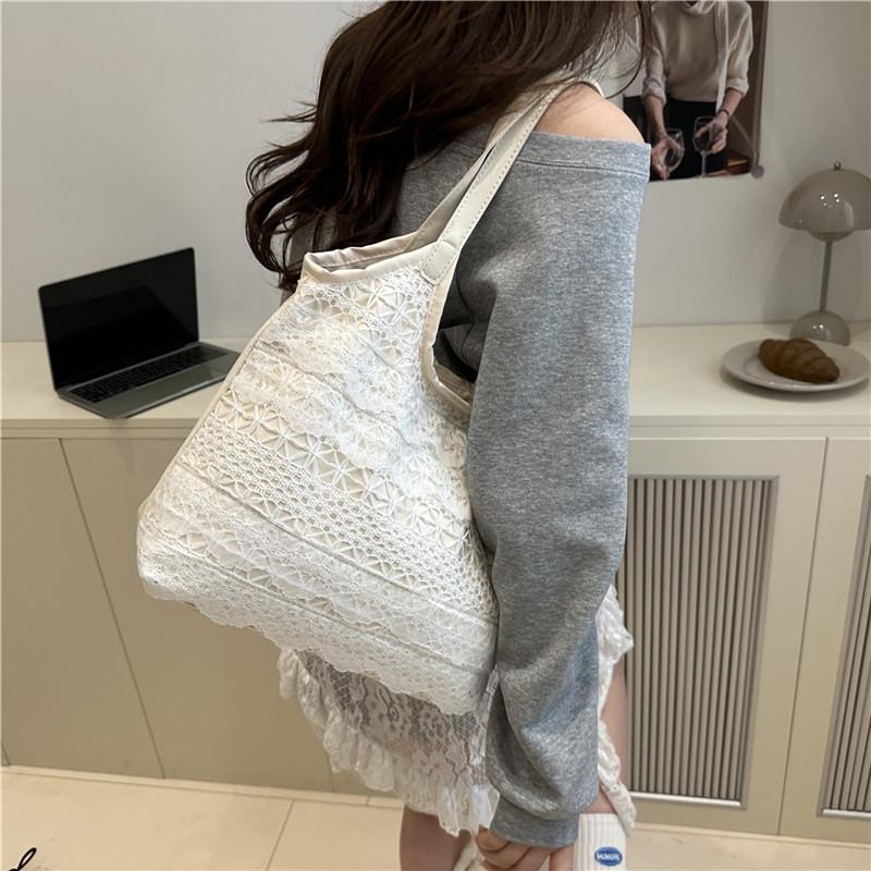 Super hot new seaside weaving large-capacity tote bag women's summer casual lace mesh single shoulder armpit bag