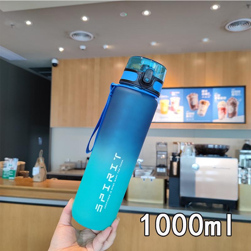 High-Capacity Gradient Sports Water Bottle with Straw - Portable and Durable for Outdoor Use
