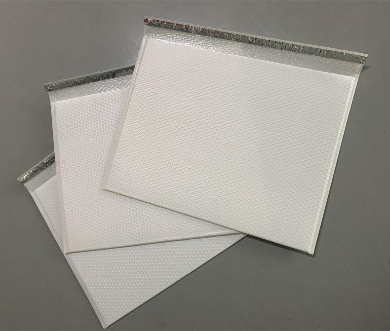 Matte Pink Co-Extruded Self-Adhesive Bubble Mailer with Black Foam Interior