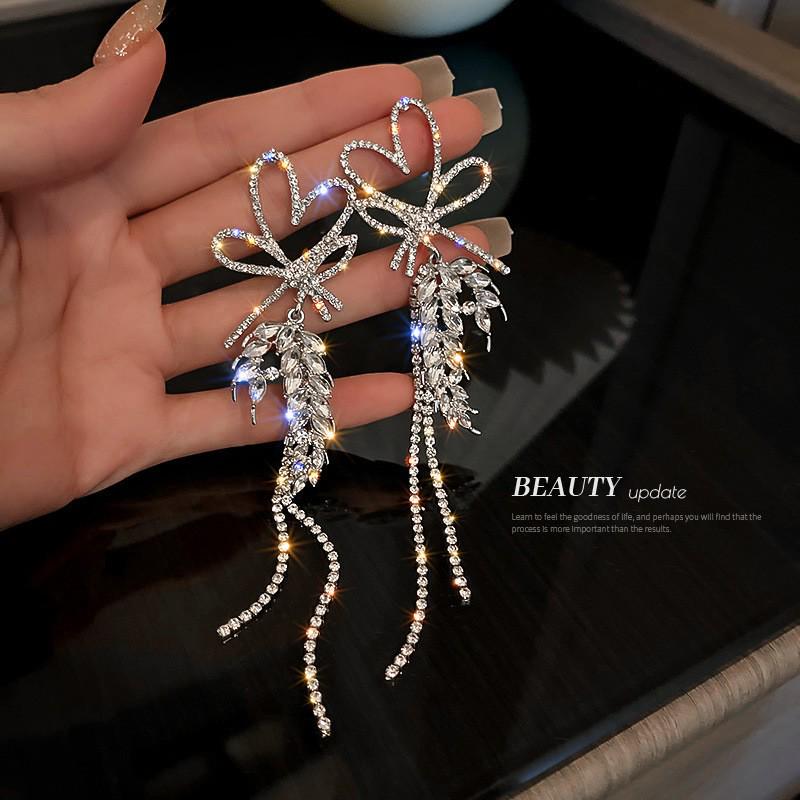 Silver Needle Diamond Water Drop Tassel Earrings - Elegant Court Style, Versatile & Luxurious Design.