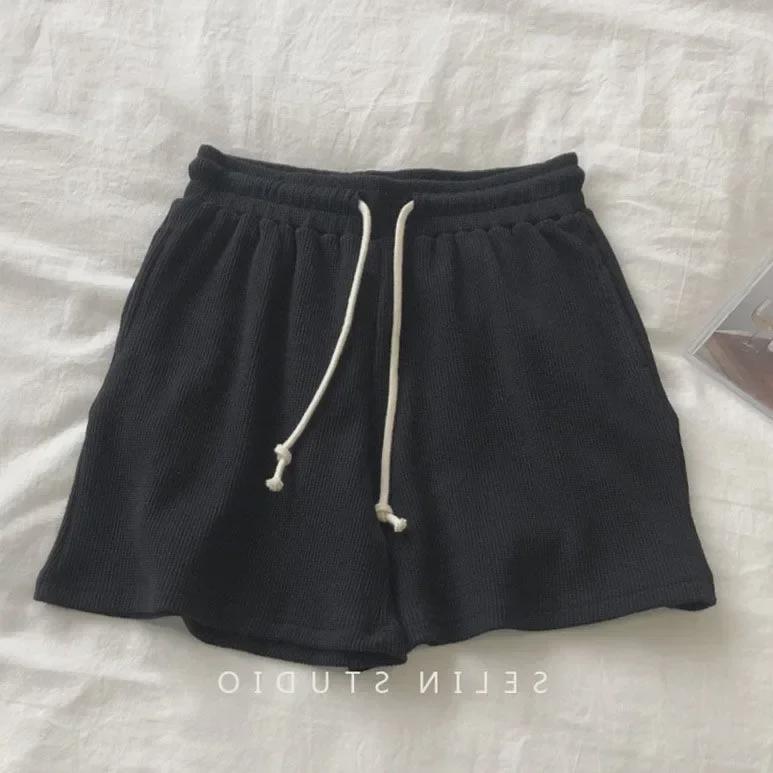 Pantaloni scurți de damă, cu o formă largi, tip waffle - pijamale ușoare, versatile, cu talie elastică și pantaloni sportivi.