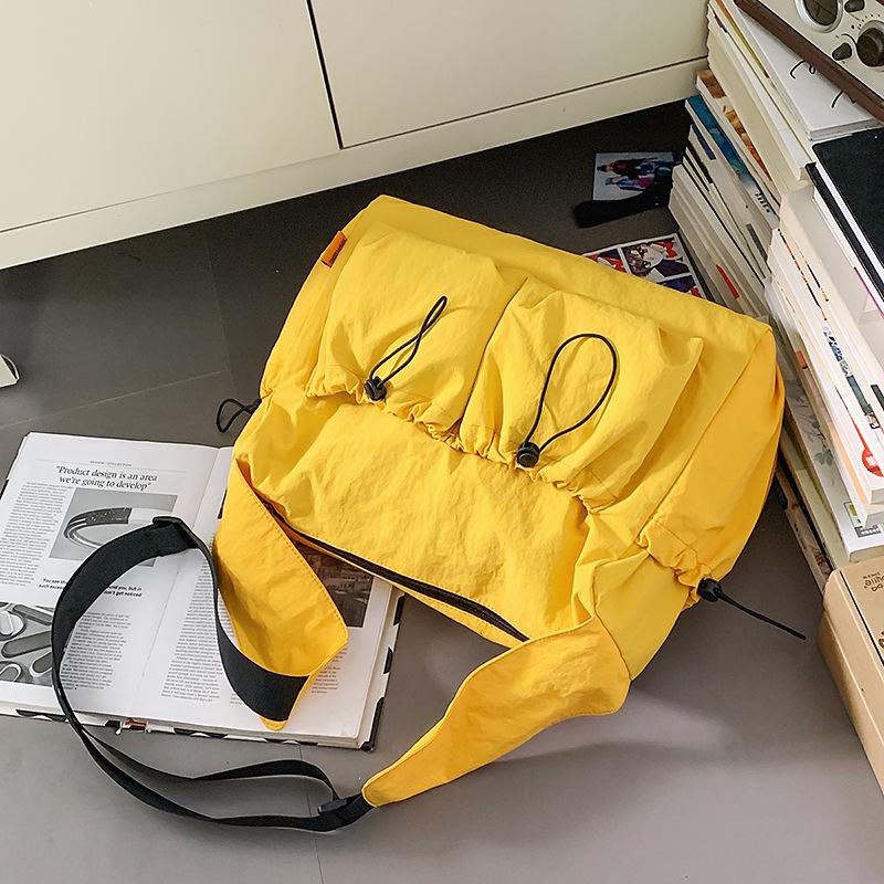 

Trendy Japanese-Style Crossbody Bag: Minimalist, Versatile & Spacious жовтий