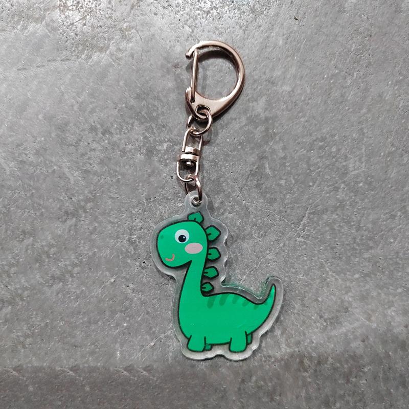 

Мультяшний акриловий брелок з динозавром Kawaii Dinosaur периферійна іграшка Рюкзак Кулон Іграшка Подарунок зелений