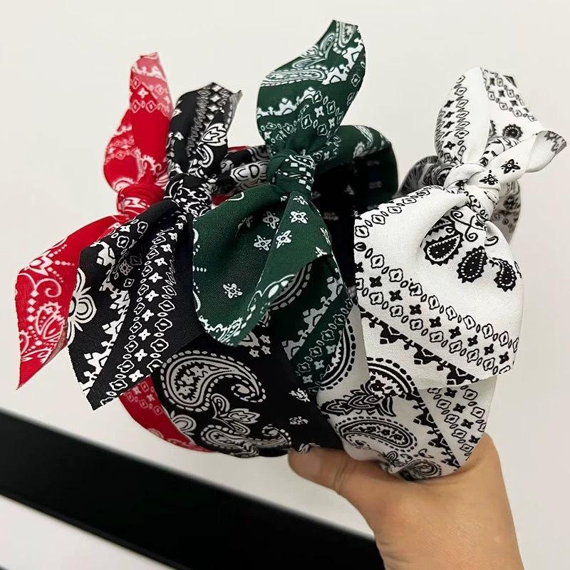 A New Autumn and Winter Style Cashew Flower Rabbit Ear Wide Headband for a Woman Pressing Her Hair Band Into a Knot