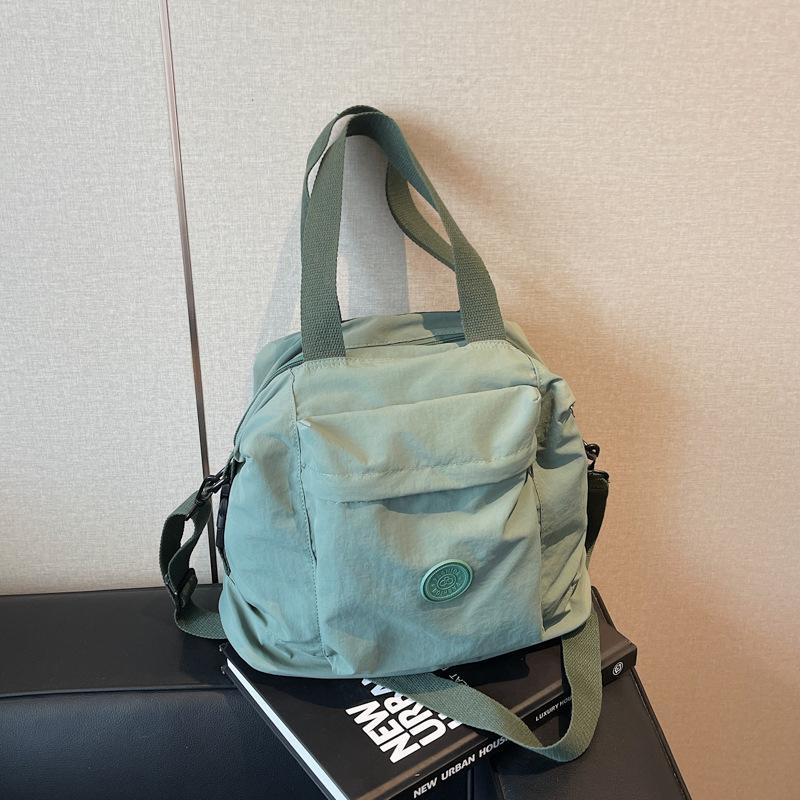 Canvas bag women's large capacity 2025 new spring and summer casual shoulder messenger bag texture class tote bag