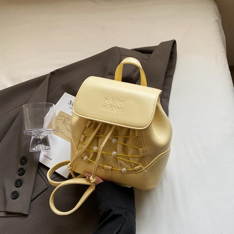 

Нишевый дизайн модный рюкзак новый высококлассный универсальный повседневный рюкзак-ведро легкий маленький рюкзак жёлтый