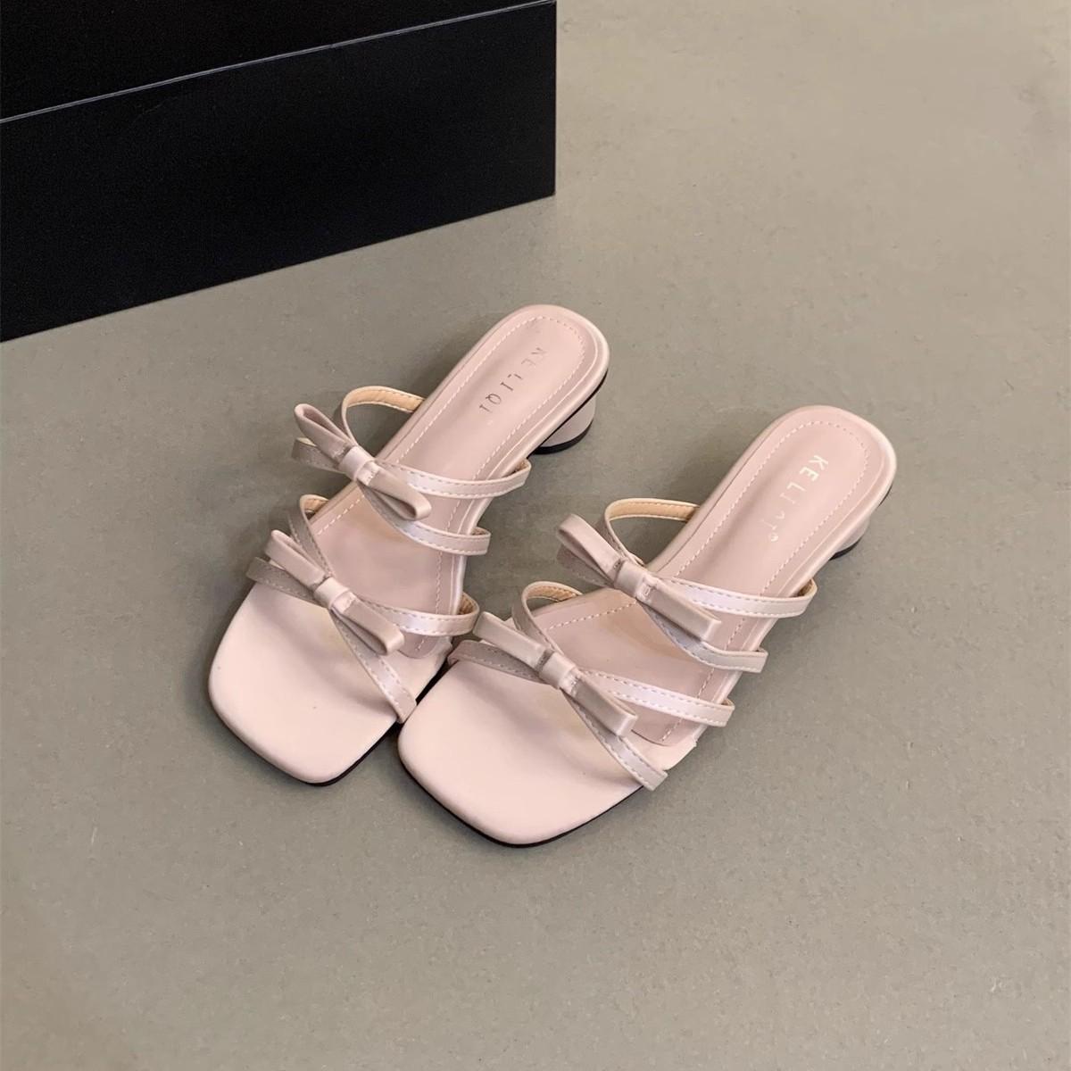 

Niche thick heel open toe one-word cool slippers women s 2025 new Korean version with skirt beautiful bow one-word sandals 35