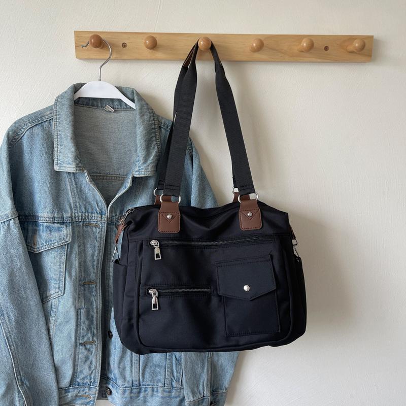 2025 new mailman large-capacity fashion simple women's lightweight shoulder bag handbag multi-functional tutoring bag bag