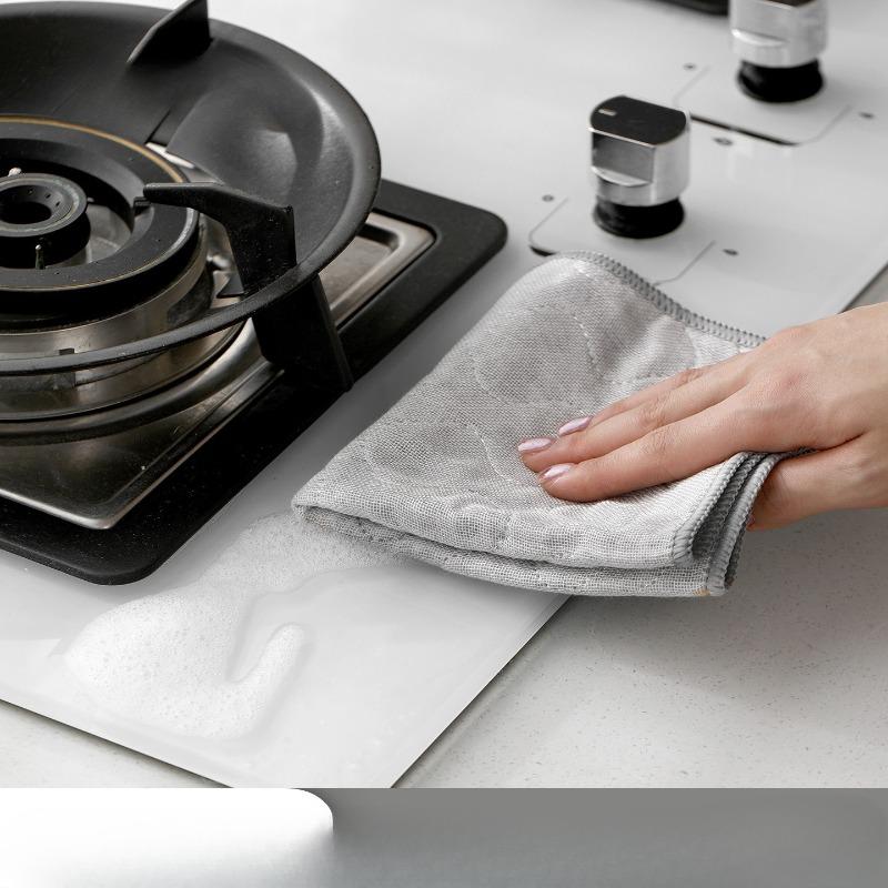 Ein spezielles Reinigungstuch für Küchenspültücher, das aufgehängt werden kann, Wasser aufnimmt und nicht an Öl klebt. Es ein fleckenentfernendes Reinigungstuch