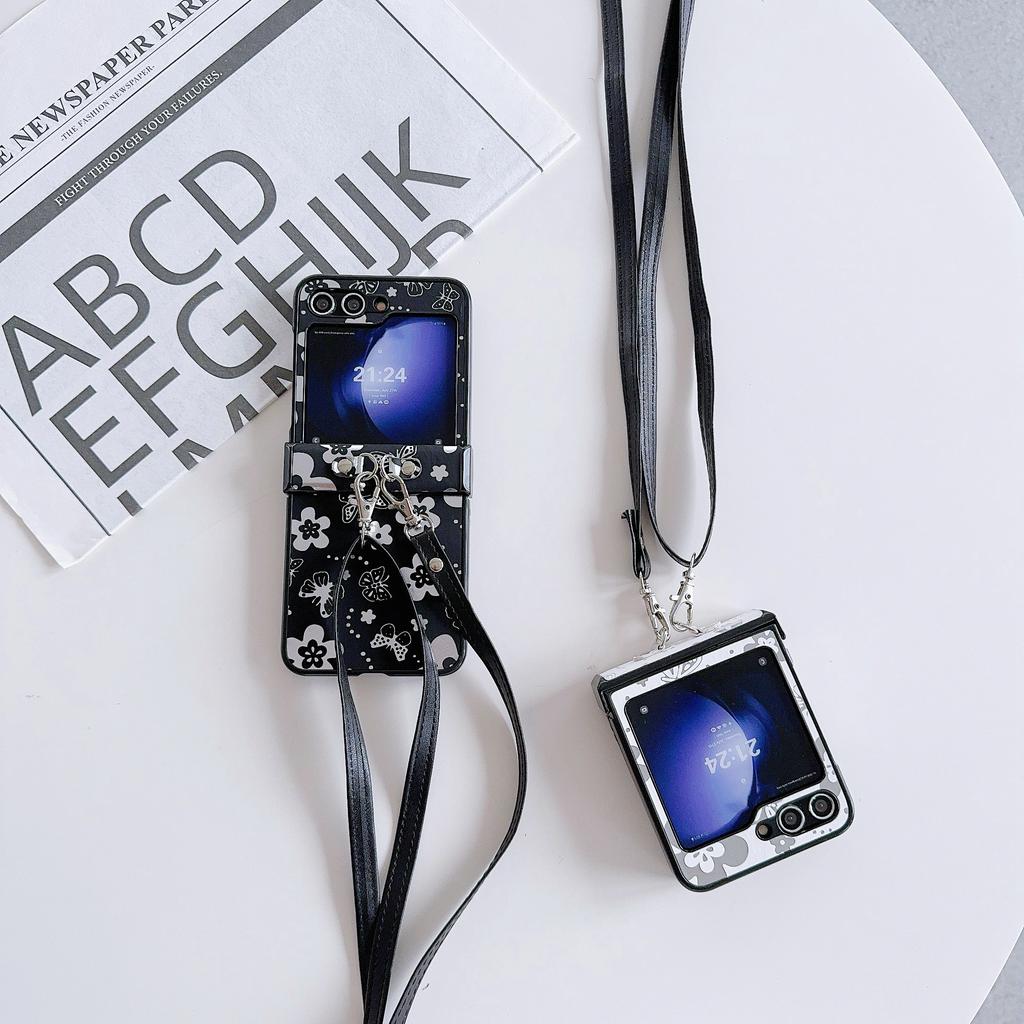 For Samsung Galaxy Z Flip7 FE 5G/Z Flip6 5G Butterfly and Flower Pattern PU Leather Coated PC Phone Cover with Crossbody Strap