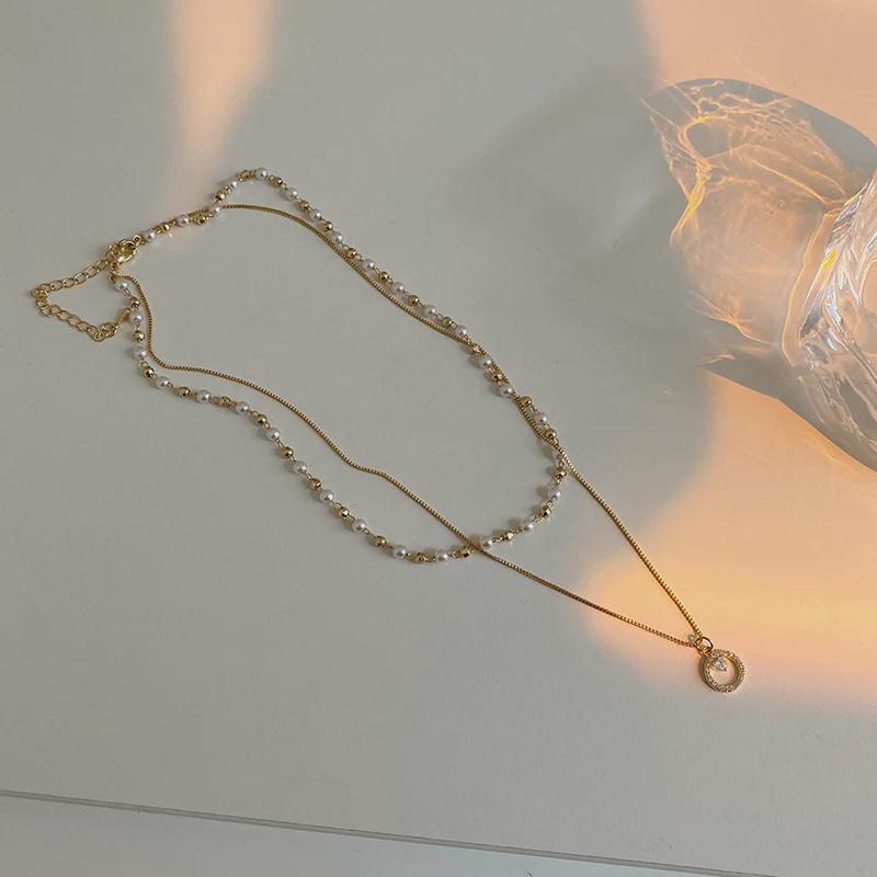 Doppellagige Halskette mit Perlenanhänger – Sommerliches Modeaccessoire im koreanischen Stil