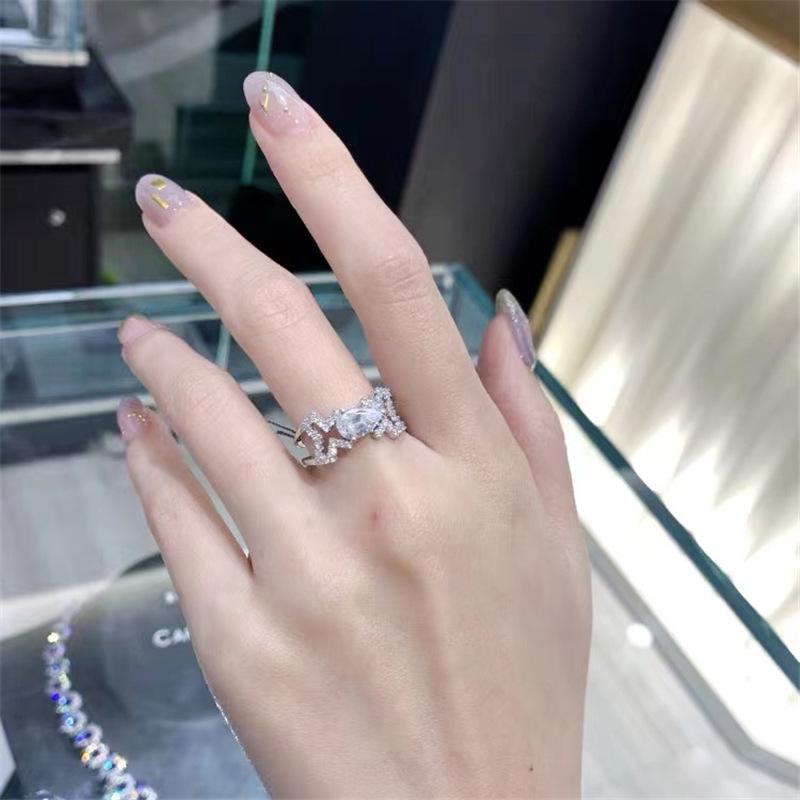 Korean-Style Micro-Paved Diamond Water Drop Ring for Women - Versatile, Fashionable, and Trendy.