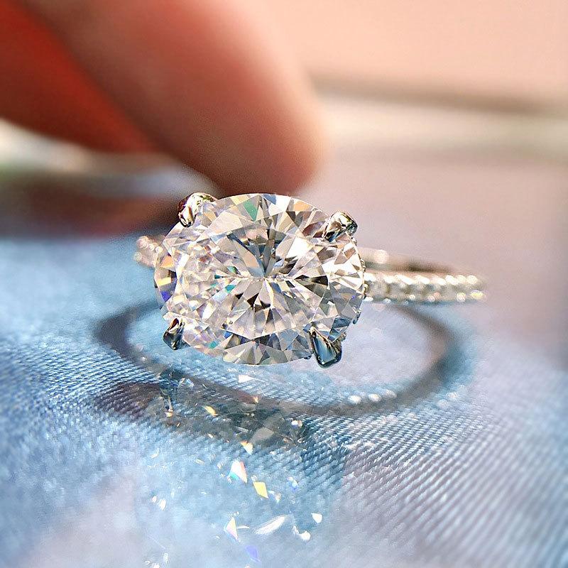 2026 Inlaid Oval Pigeon Egg Cube Zirconia Ring, Fashionable and Personalized Platinum Engagement High-quality Jewelry