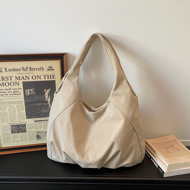 

New Korean Style Folded Casual Shoulder Bag Large Capacity Lightweight Shopping Bag Comfortable and Versatile Texture Coach Bag