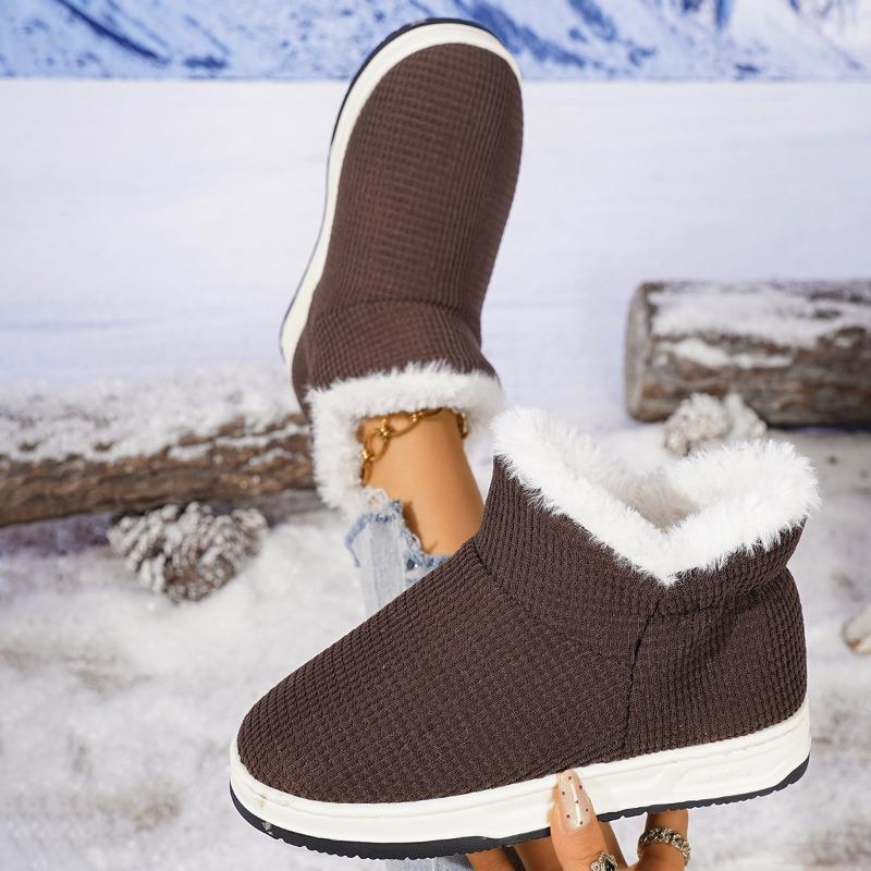Non-slip thick-soled winter warm cotton slippers are all-inclusive, and men's and women's indoor soft-soled piled and thickened fluffy cotton shoes.
