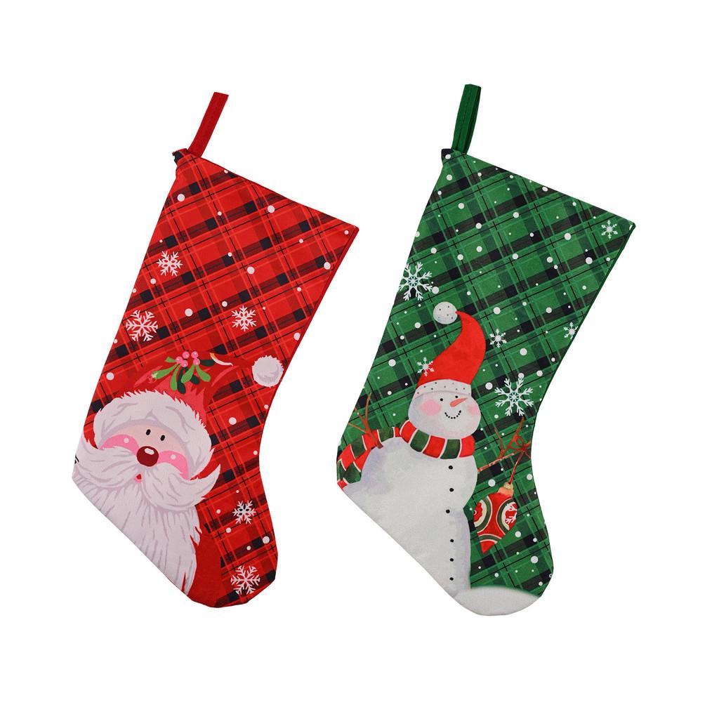 Christmas Playful Stockings In Rich Red And Green Fabric Featuring Snowflakes And Holiday Characters