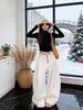 Women's White High-Waisted Curved Wide-Leg Pants, Popular Autumn/Winter Style, Casual Long Fit for Petite Figures.