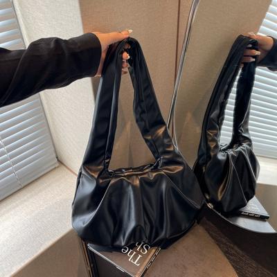 Frühling neue Pendler Achseltasche Damen neue vielseitige Retro-Mode plissierte Schultertasche Nische Damenhandtasche