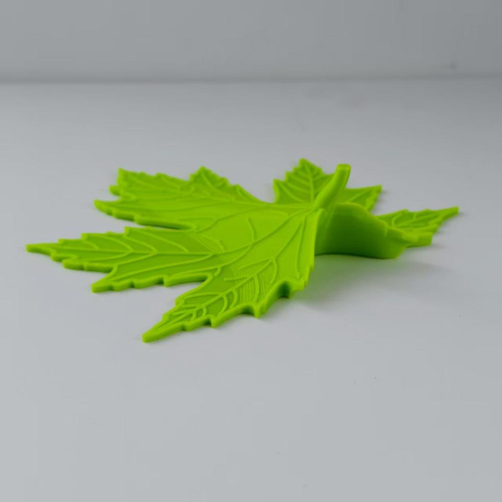1 Stück Kleiner, niedlicher, minimalistischer Türstopper mit Blattdesign. Ein künstlerisches und praktisches Heimdesign-Werkzeug, geeignet für Türspalte von 3 mm bis 13 mm.