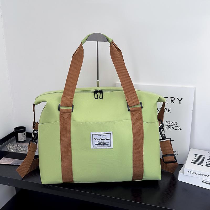 Travel bags for women and men, short-distance luggage storage, large-capacity business travel light travel bags, leisure new portable messenger bags