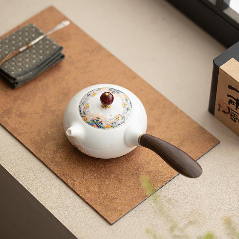 Suet jade porcelain high white porcelain seawater river cliff side handle pot office household teapot tea ceremony tea set kung fu tea set