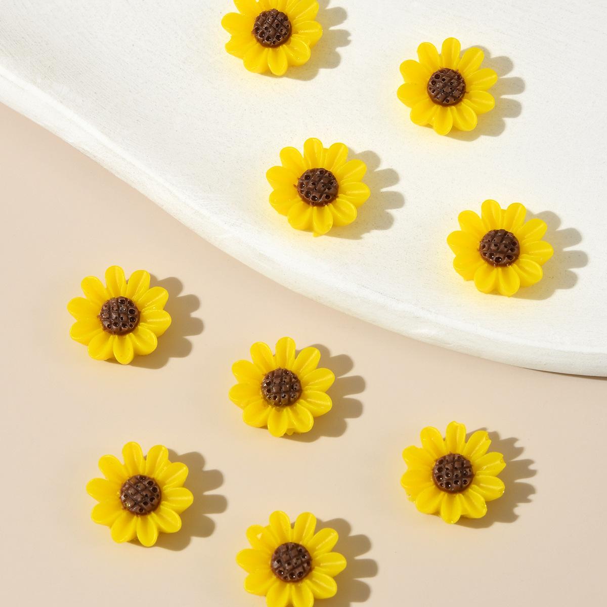 

Vibrant Mixed Resin Mini sunflower Flat Back Flower Figurines for Nail Art,Wedding DIY, Scrapbooking,Jewelry Crafts,Accessories
