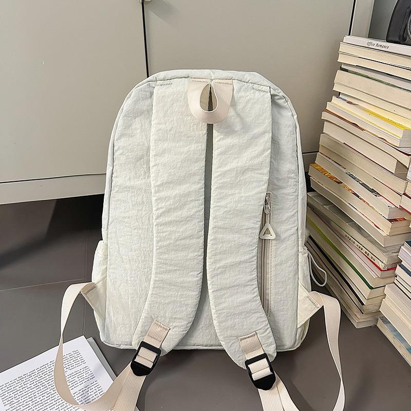 The new schoolbag is high-value, fresh and sweet, candy-colored backpack, lightweight and large-capacity backpack for junior high school students.