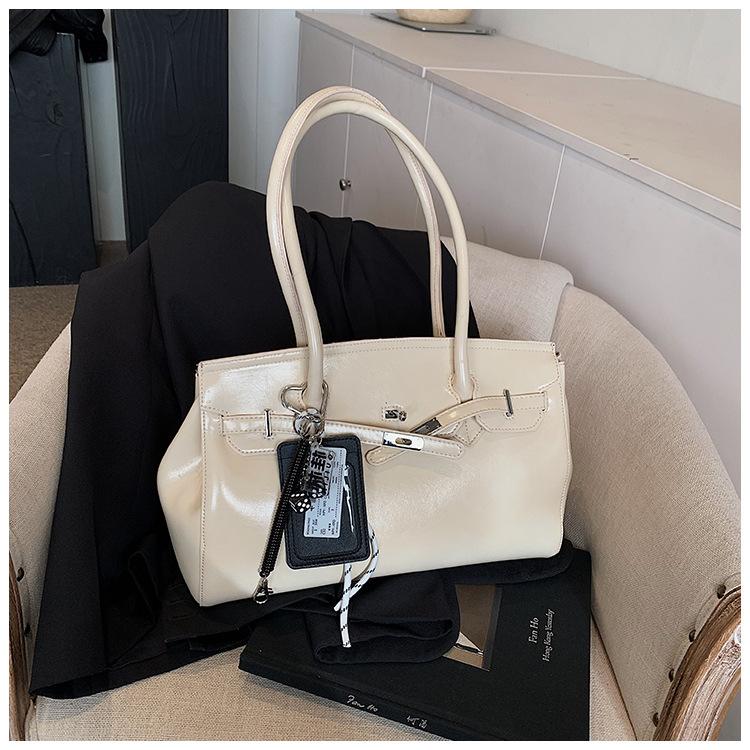 

Textured spring bag women s bag 2025 tote bag fashionable large-capacity niche handbag no pendant белый