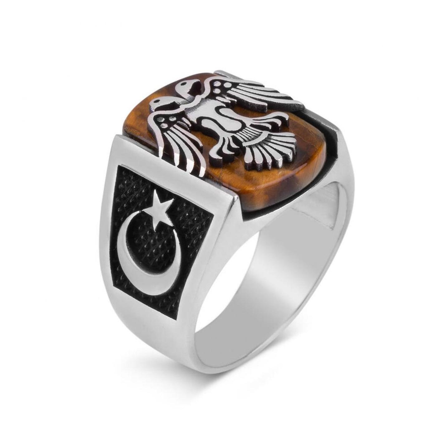 

Новое серебряное кольцо с двуглавым орлом, полумесяцем и звездой, тигровым глазом и камнем