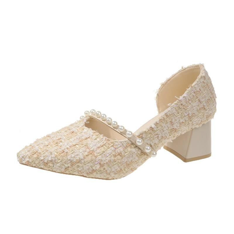 2025 new Xiaoxiangfeng pointed high heels women's thick heels are not tired feet shallow mouth side empty gentle temperament single shoes