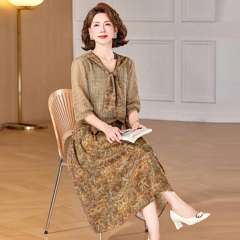 

Elegant Floral Two-Piece Set: Sleeveless Dress and Short Sleeve Cardigan for Mature Women 5XL (150-165 jin)