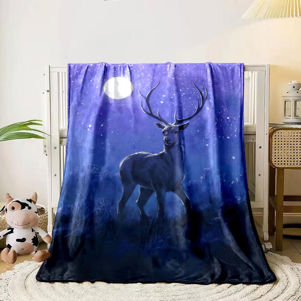 A stag stands in a moonlit, snowy, and serene nighttime setting. for all seasons blanket lunch break throw gift 80cm x 120cm