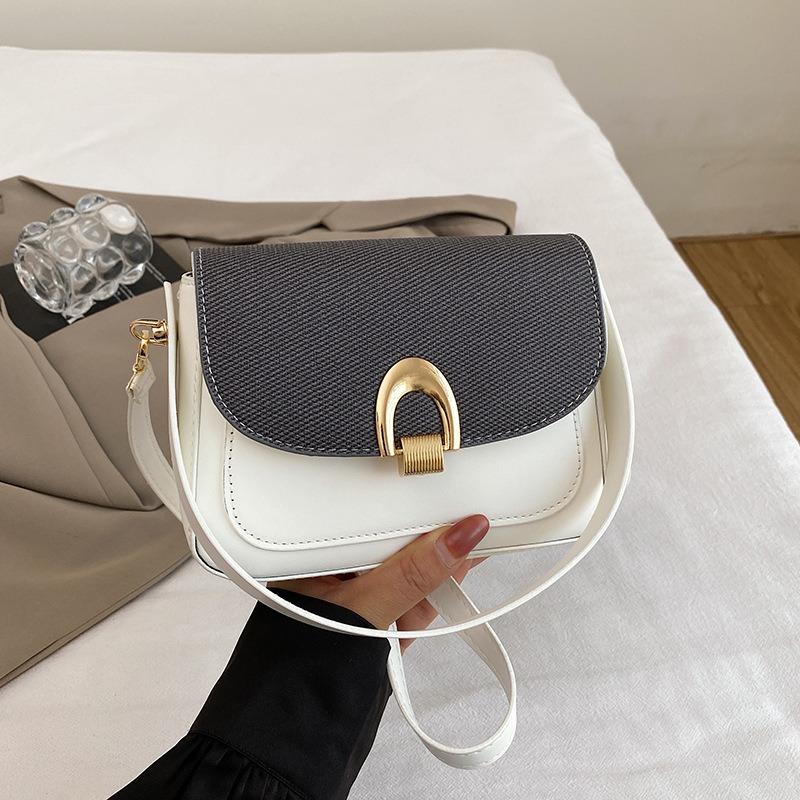 Retro niche underarm bag women's new trendy fashion saddle bag simple and versatile shoulder messenger bag