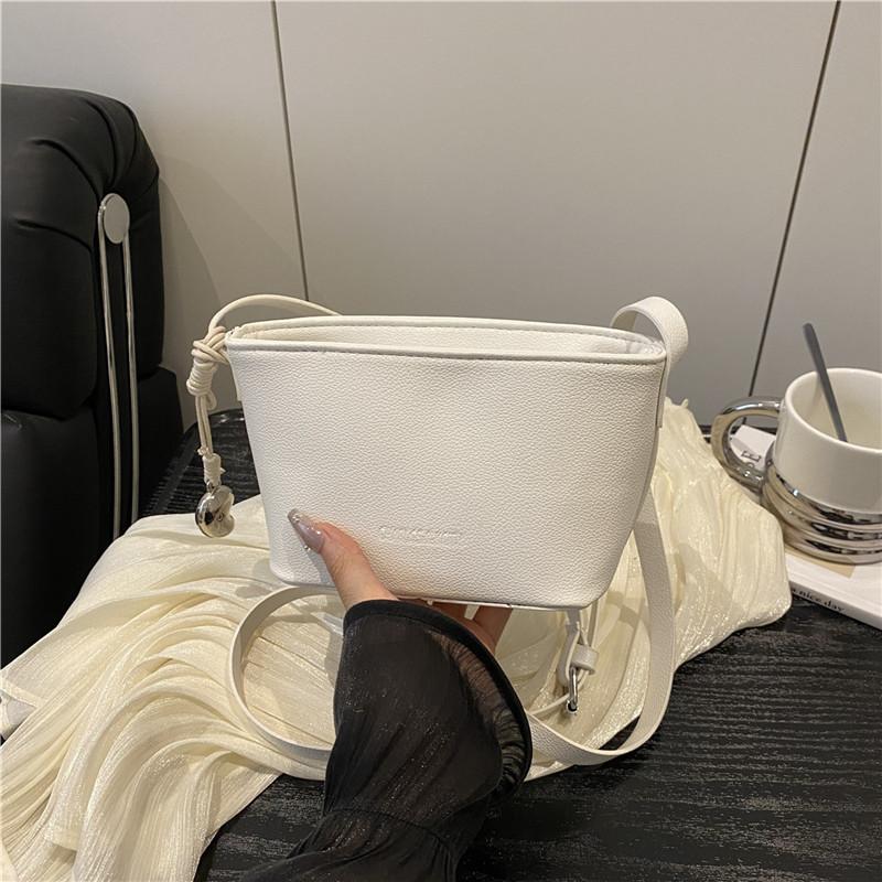 

Niche lychee pattern bucket bag women s new Senmeng single shoulder oblique span women s bag trendy fashion mobile phone bag білий