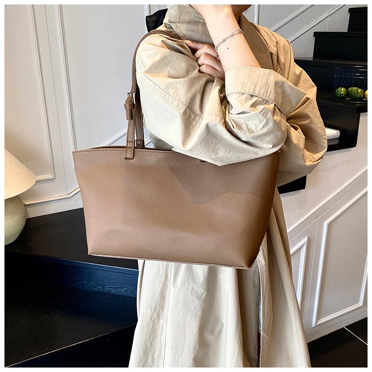 Einfache und vielseitige Tasche Damen große Kapazität neue Sommer Freizeit Schultertasche strukturierte Pendler Tragetasche