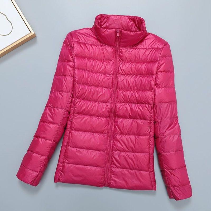 Light down jacket women's short stand-up collar hooded fashion autumn and winter thin large size women's clothing slim-fitting portable jacket