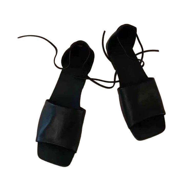 Cowhide version~ niche open-toe one-word sandals women's flat-bottomed strap bag and half slippers for outer wear