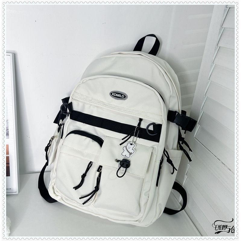 Korean version of versatile tooling style schoolbag female student large capacity Japanese bag travel backpack men and women backpack