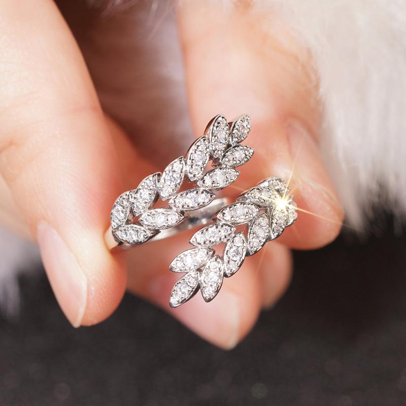 2026 New European and American Adjustable Women s Ring with Leaf Shaped Design Zircon Leaves Shining Fashion Zircon resizable