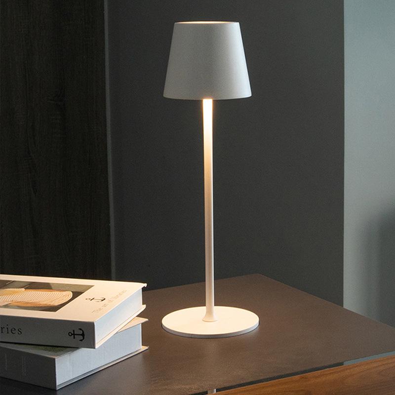 High-Legged Iron Art Black Floor Lamp with Induction Night Light for Dining Table and Bedside Ambience.