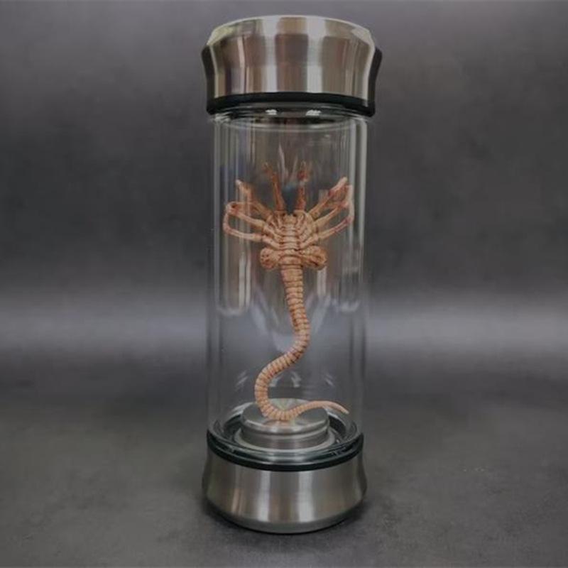 Shaped Glass Jar with LED Light and Glowing Figurine for Home Decoration
