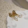 Gold-Plated Brass French Modern Croissant Baroque Pearl Earrings with 925 Silver Needle