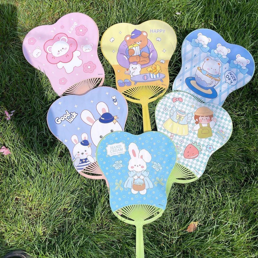 

Large Round Cartoon Plastic Hand Fan for Summer - Cute, Windy, and Perfect for Students & Homes