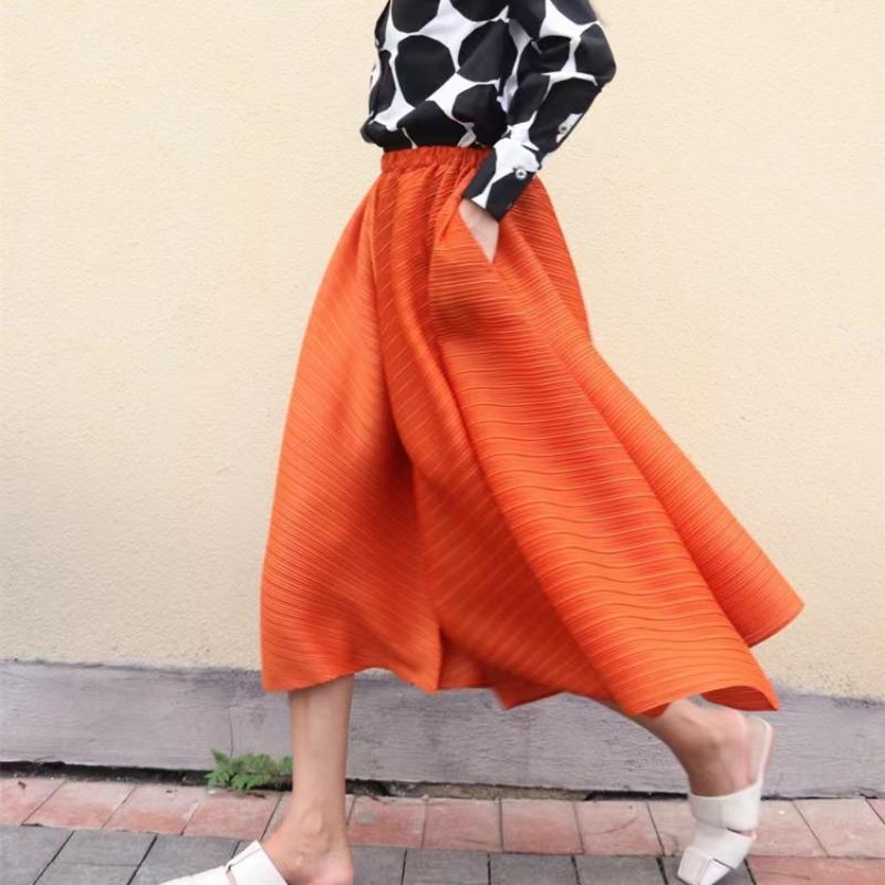 

Брюки-юбки со складками и неровным краем и свободные широкие брюки в форме зонтика. One Size оранжевый