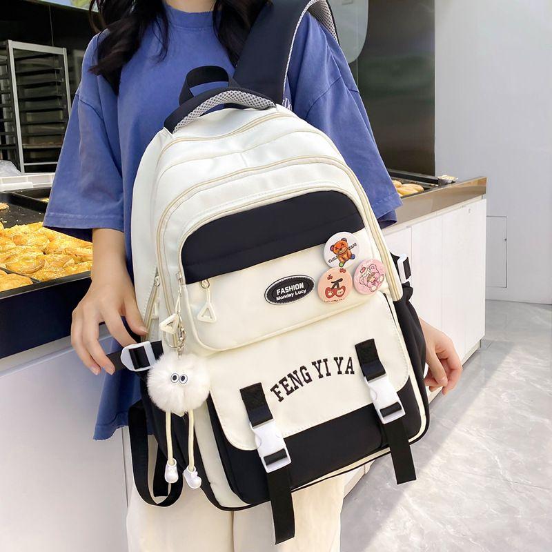 

Корейский стиль Преппи стиль Девочки-подростки Ученики средней школы 3-6 классы Большая вместимость Сверхлегкий Защита позвоночника Девочки Black shoulder bag + badge + pendant