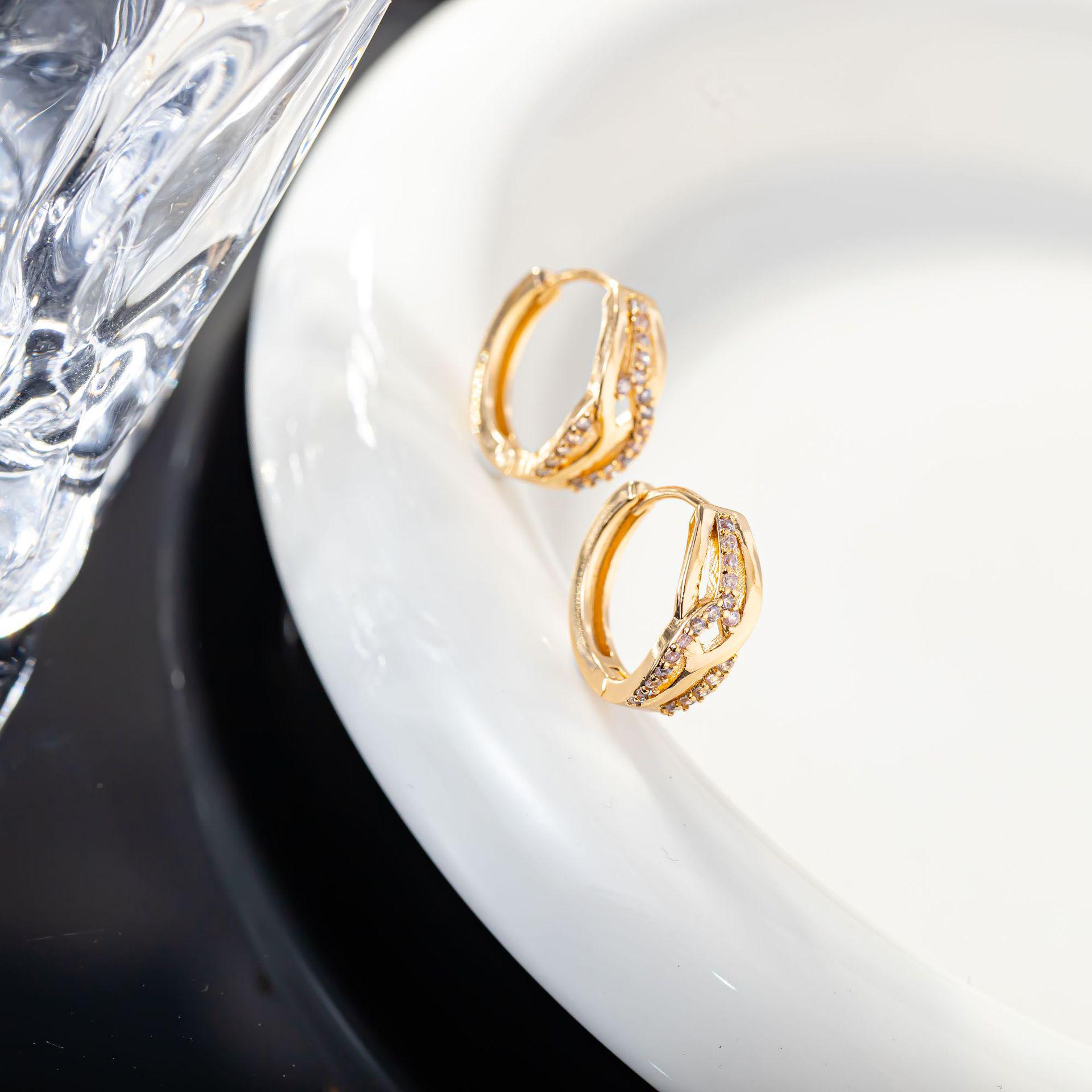 Korean Japanese Dongdaemun Double U Interlocking Earrings, Gold-Plated Copper with Micro Inlaid Zirconia Diamonds.